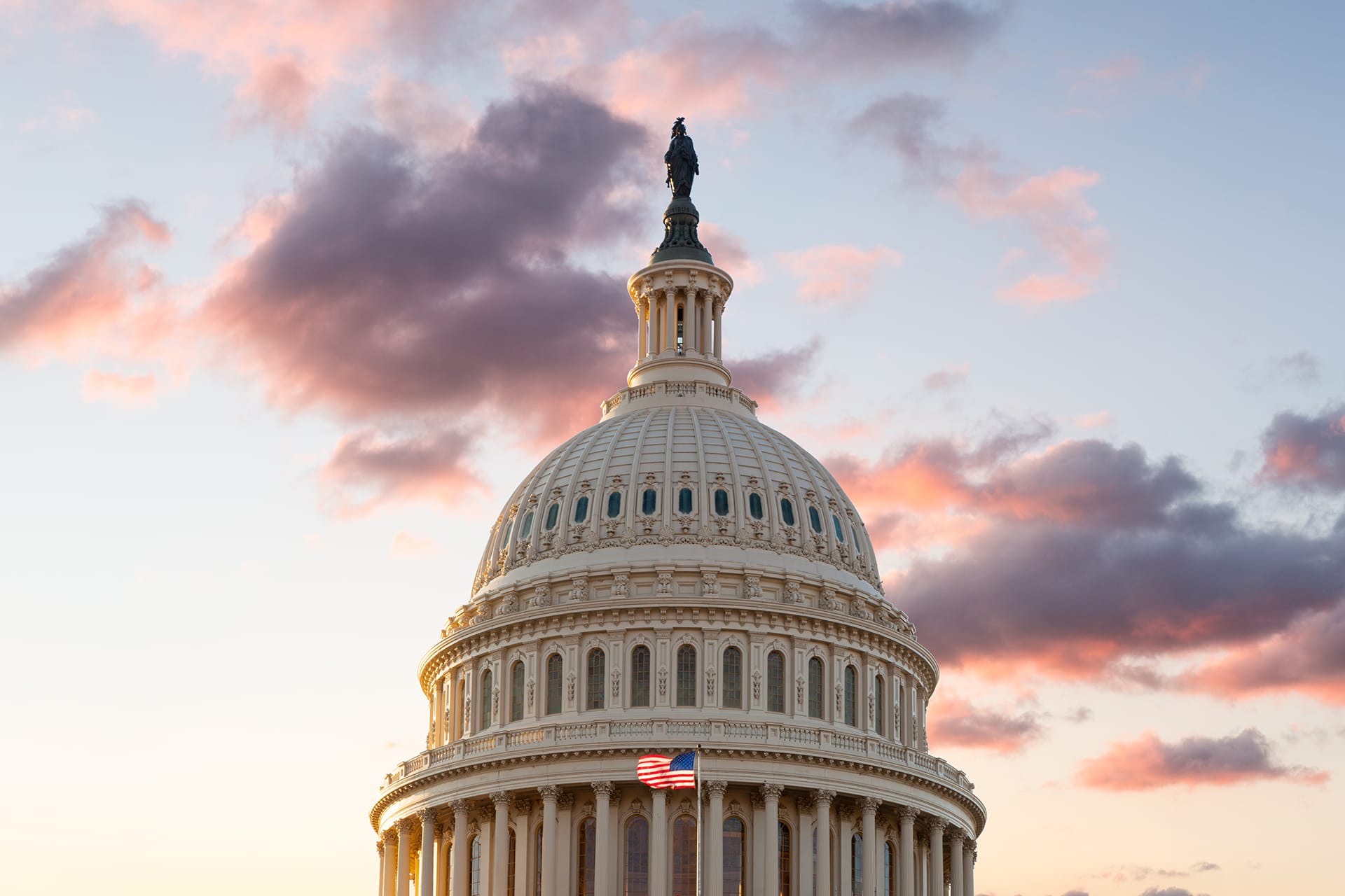 us-flag-flies-front-us-capitol-washington-dc-as-sun-rises-dawn-new-day