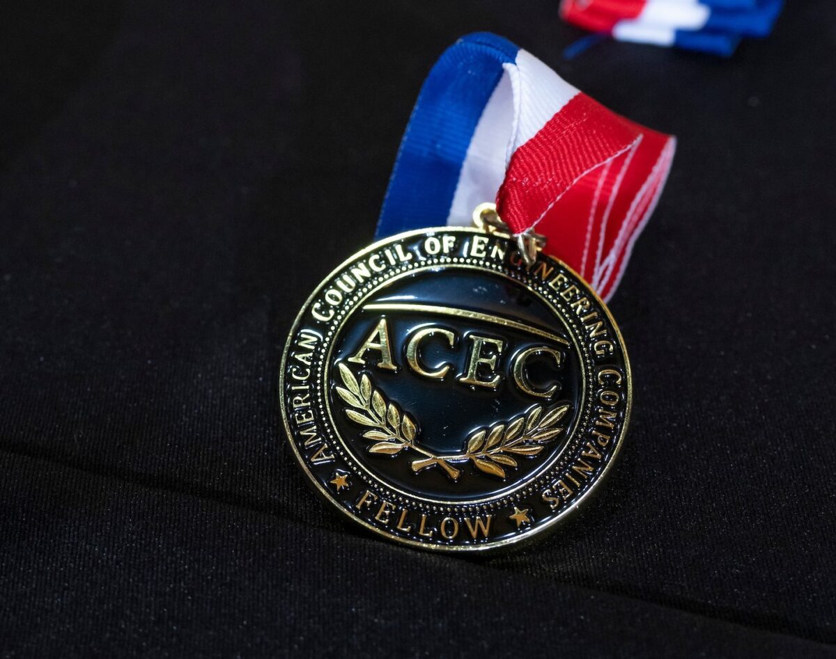 College of Fellows medal lined up on table