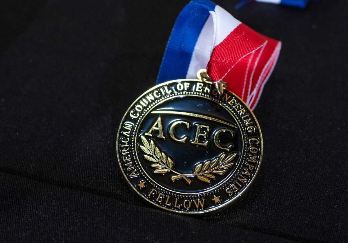 College of Fellows medal lined up on table