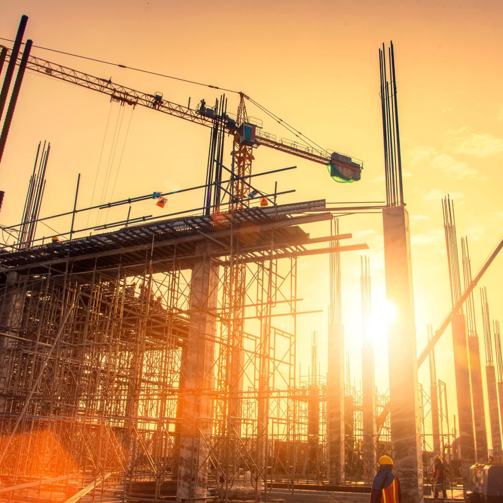 Silhouette civil site engineer and construction worker working