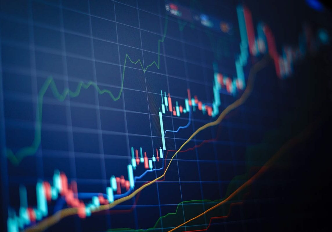 Closeup financial chart with uptrend line candlestick graph in s