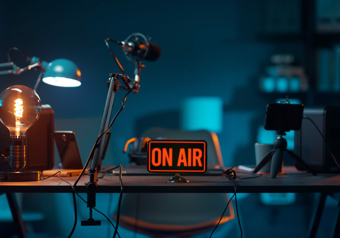 Live online radio studio desk with on air sign, entertainment and communication concept
