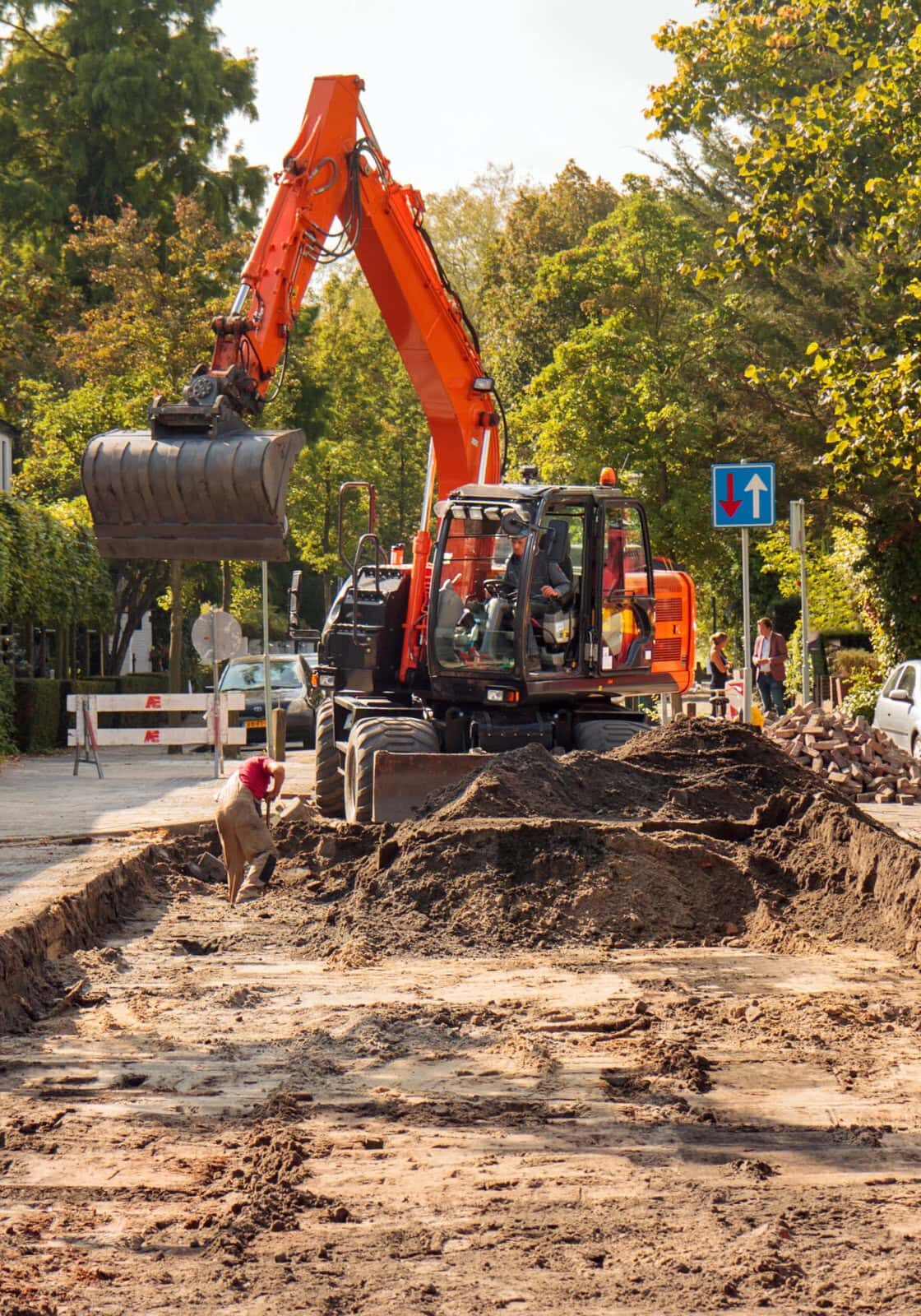 Sewerage works in a residential area: preparatory removal of pavement Sewerage works in a residential area: preparatory removal of pavement