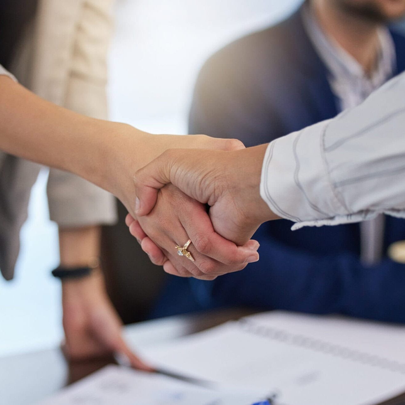 B2b, shaking hands and thank you handshake of a corporate worker in a office. Business deal, partnership and we are hiring gesture with a female hr manager ready for onboarding welcome with trust.