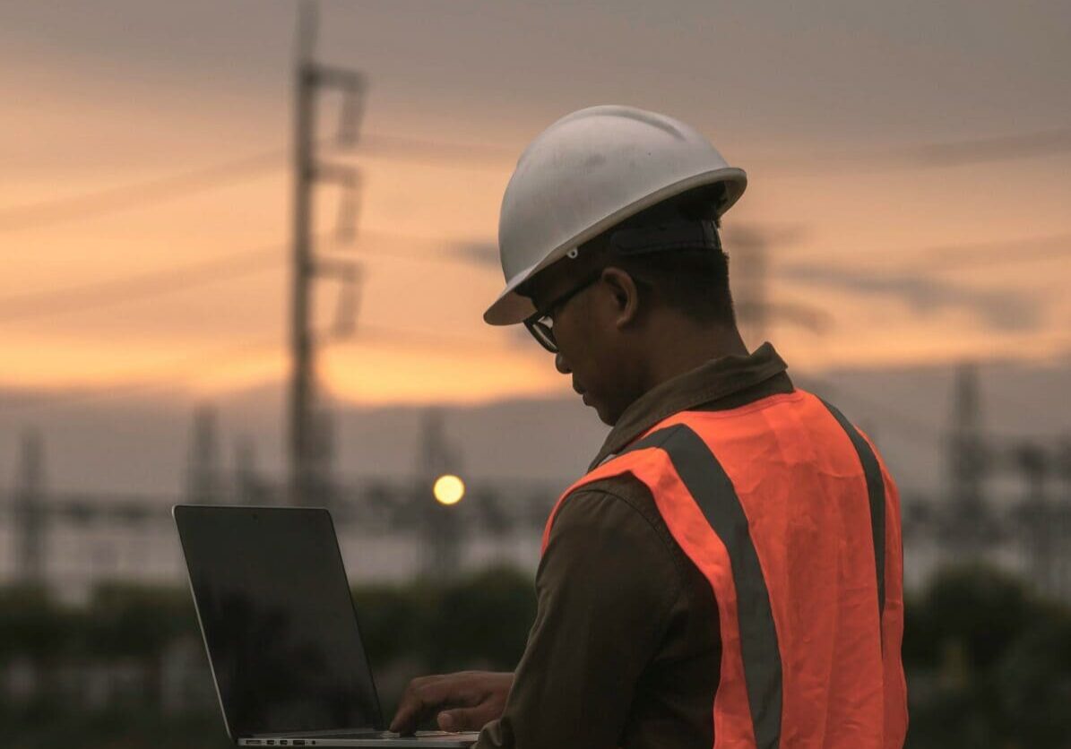 engineer holding his laptop