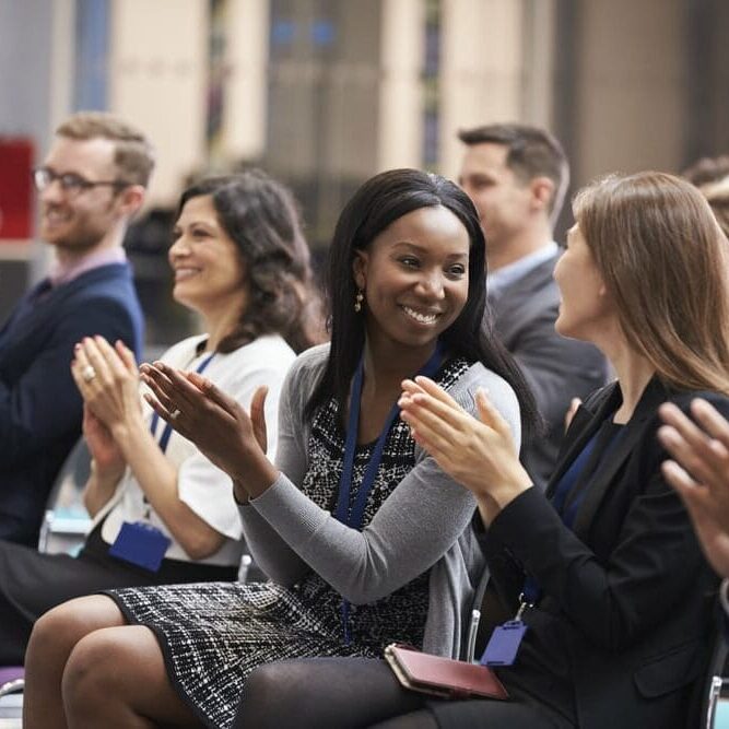 conference audience applauding