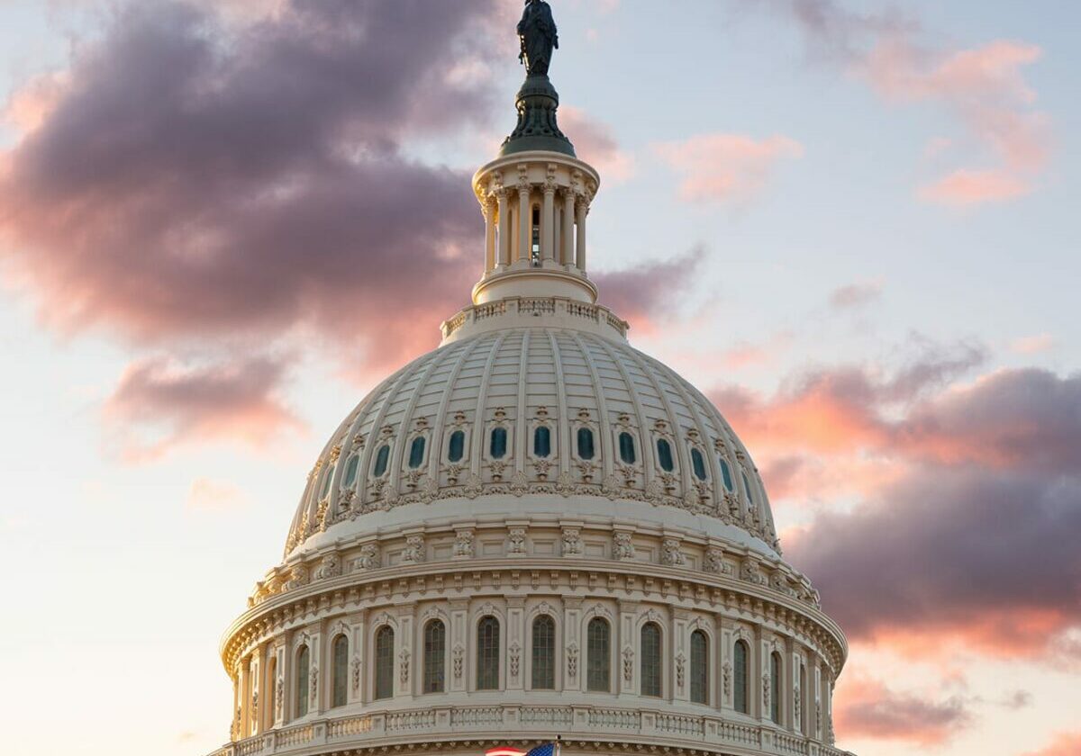 us-flag-flies-front-us-capitol-washington-dc-as-sun-rises-dawn-new-day